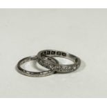 An Edwardian white metal diamond eternity style ring with later added plain panel to ring, set