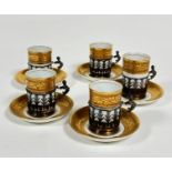 A Limoges ten piece porcelain coffee set, comprising, five gilded coffee cans with Birmingham 1926