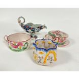 Two French Quimper style two handled soup cups decorated with traditional basket of flowers