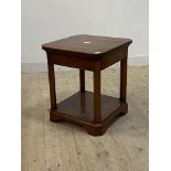 A cherry wood two tier lamp table, H65cm, 57cm x 57cm