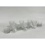A set of six Edinburgh crystal hobnail and slice cut red wine glasses on baluster supports and
