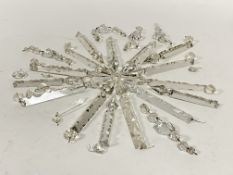 An early 20th century single branch chandelier, with three tiers of crystal lustre drops of