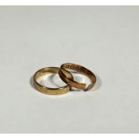 An 18ct gold wedding band a/f, (1.17g) and a 9ct gold wedding band (O) (2.41g)