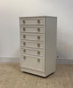 A vintage white painted chest, fitted with six drawers, raised on castors, H112cm, W61cm, D45cm