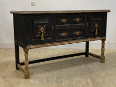 An early to mid 20th century painted oak dresser base of 18th century inspiration, fitted with two