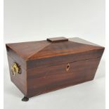 A Regency mahogany sarcophagus shaped tea caddy with satinwood inlaid border enclosing a fitted