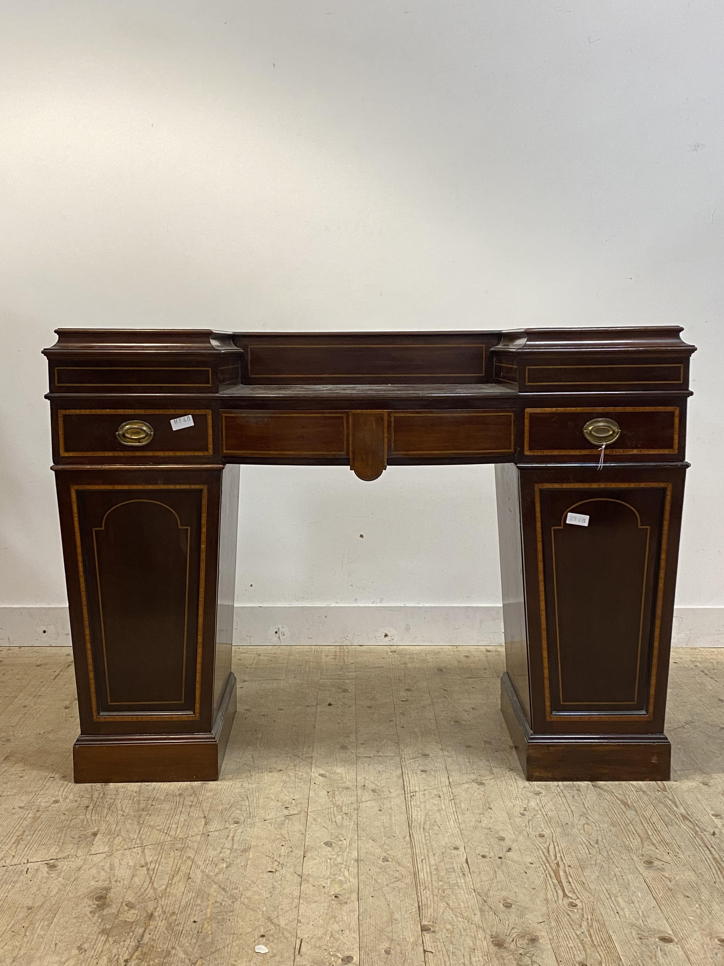 An Edwardian Sheraton revival mahogany twin pedestal sideboard, inlaid with satinwood cross bands