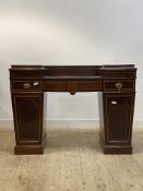 An Edwardian Sheraton revival mahogany twin pedestal sideboard, inlaid with satinwood cross bands