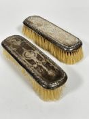 A pair of Edwardian Birimgham 1912 silver engraved backed hairbrushes of rectangular form, one