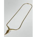 A 9ct gold snake link chain pendant cross over necklace (L: 22cm) complete with clip fastening, (