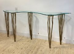 Domus nova, an Italian designer console table, the top of abstract form with moulded edge raised