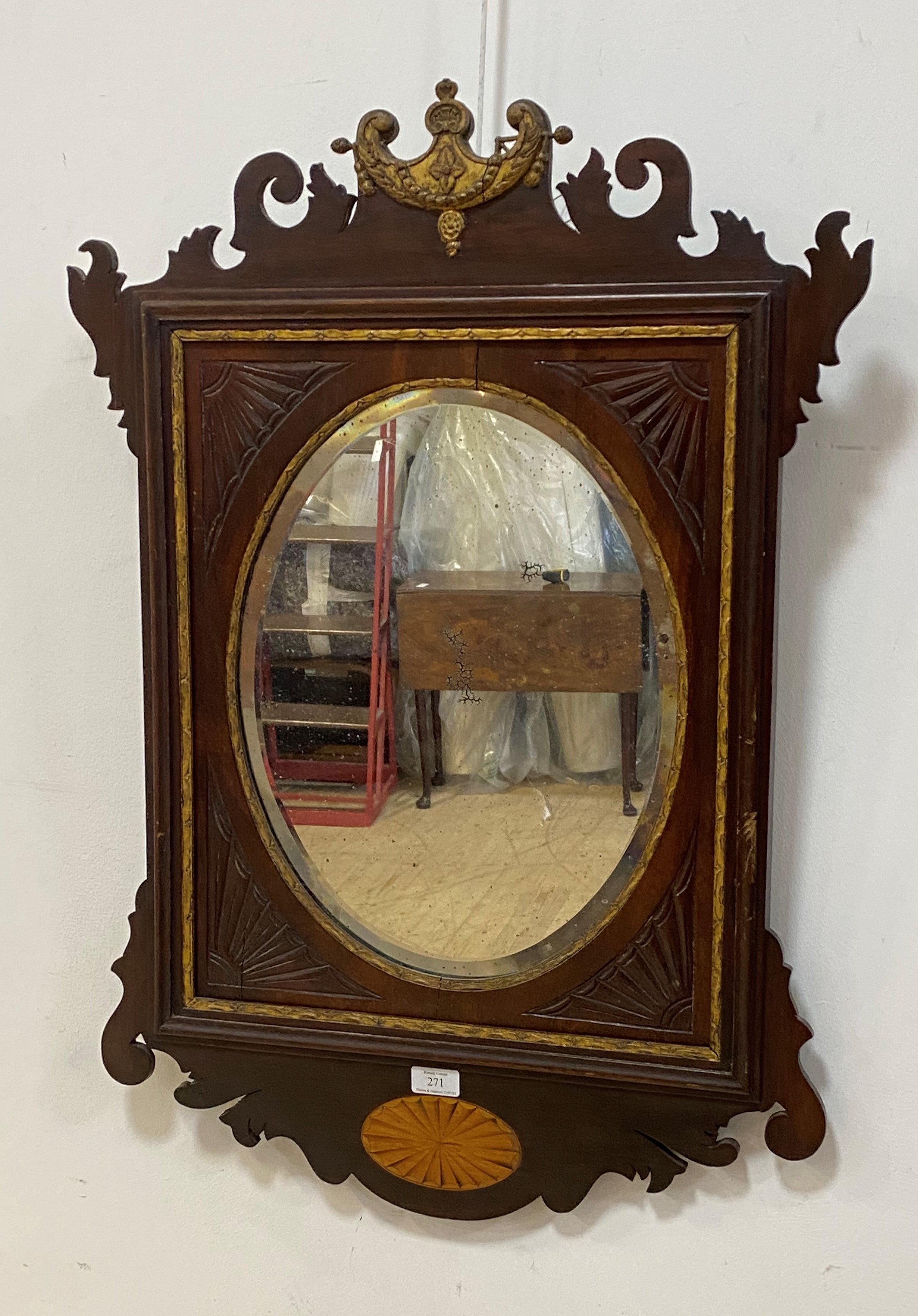 An Edwardian parcel gilt mahogany framed wall hanging mirror in the Neoclassical taste 85cm x 59cm