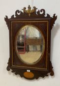 An Edwardian parcel gilt mahogany framed wall hanging mirror in the Neoclassical taste 85cm x 59cm
