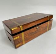 A 19thc rosewood brass bound box desk the rectangular top with rounded angles enclosing a fitted