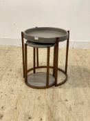 A contemporary stained ash and bronzed metal nest of two tables, the larger with tray top, H57cm,