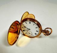 A gold plated full hunter pocket watch with enamel dial and subsiduaries dial with Roman