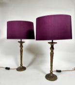 A pair of Heathfield & Co Olivia bronze cast finish Giacometti style candlestick table lamps,