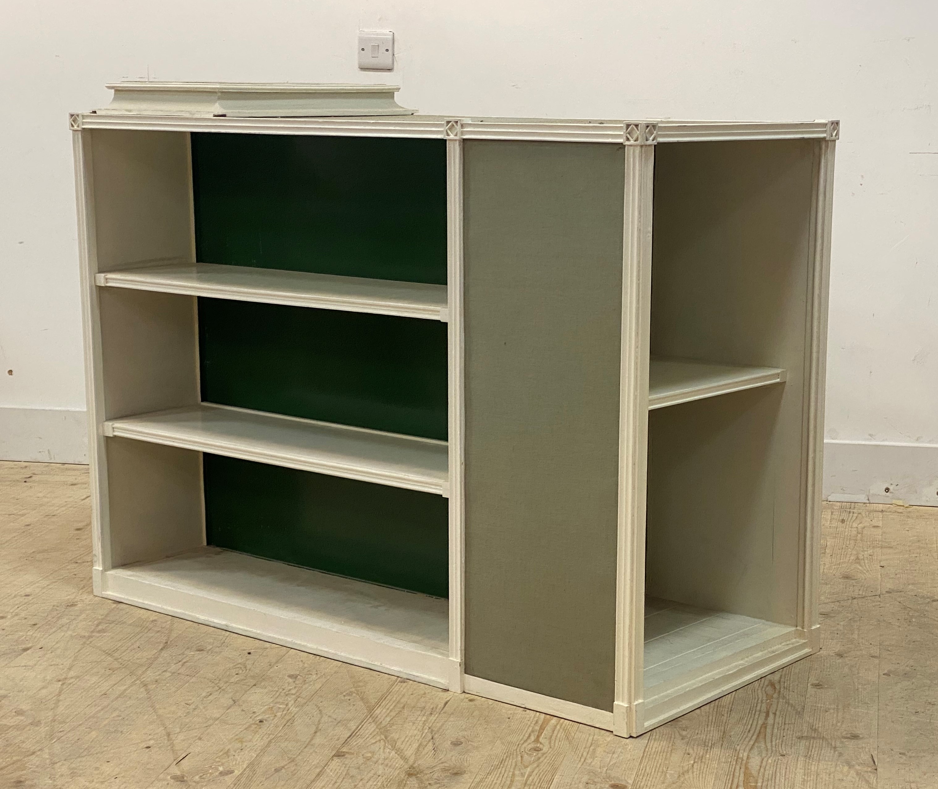 A 20th century white painted pine centre library bookcase, fitted with adjustable shelves all round,