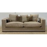 Accension Lattore, A large contemporary sofa of rectangular outline, the steel studded frame and