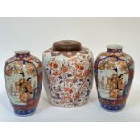 A large Kutani style ginger jar with polychrome enamel decoration of mythical creatures and floral