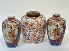 A large Kutani style ginger jar with polychrome enamel decoration of mythical creatures and floral