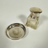 An Edwardian Chester 1908 silver circular pin dish, (0.5cm x 6.5cm) (12.4g) and a Birmingham