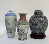 A group of Chinese ceramics comprising a modern enamelled vase with eight Taoist Immortal (six