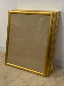 A group of ten art glass glazed gilt wood picture frames, each complete with backing 84cm x 100cm