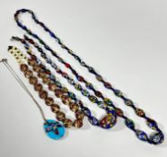A large graduated strand of Murano Millefiori cased glass beads, (L: 43cm) a similar smaller strand,