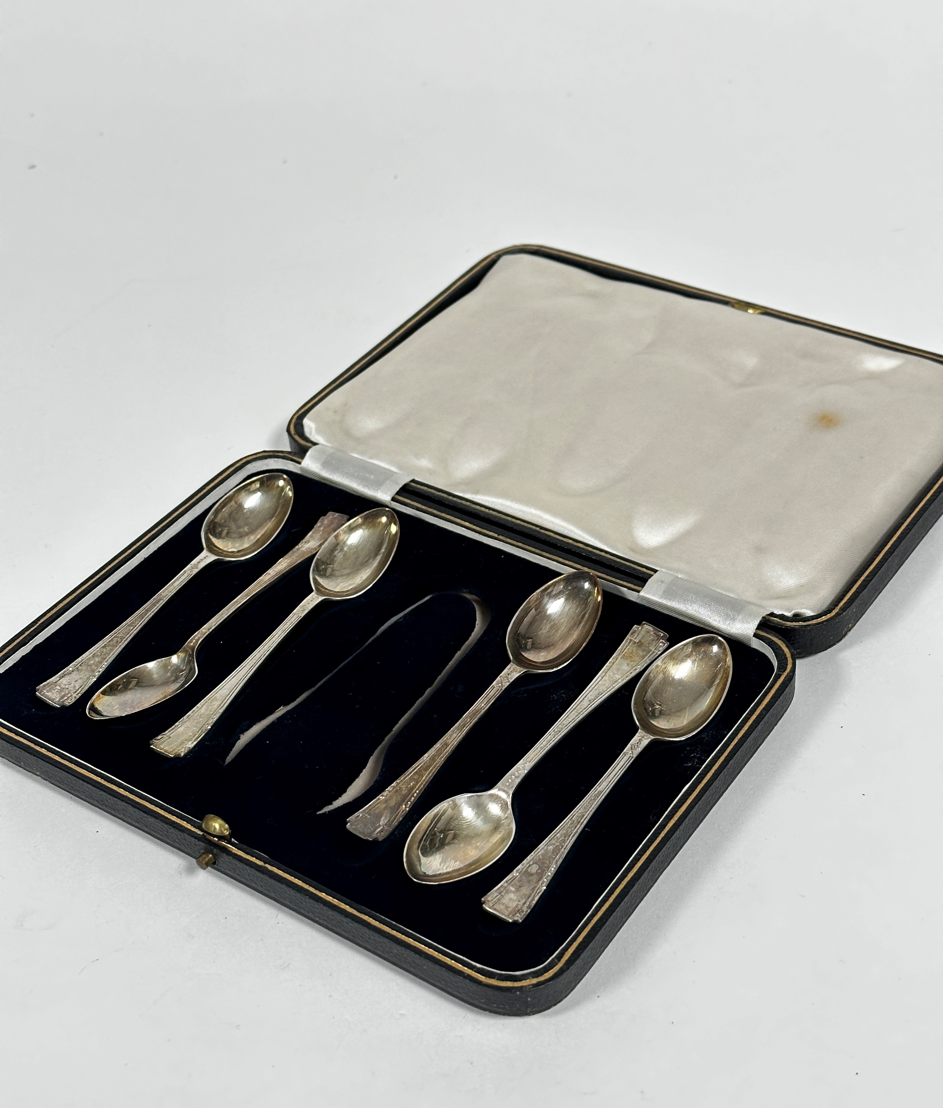 A set of six Birmingham 1939 silver teaspoons complete with pair of matched tongs, (87.3g)