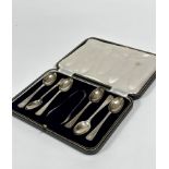 A set of six Birmingham 1939 silver teaspoons complete with pair of matched tongs, (87.3g)