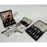 A collection of Epns including a set of six grapefruit spoons in fitted case, a pair of Epns sauce