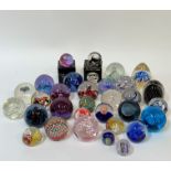 A large collection of studio/art glass paperweights comprising several Scottish/Caithness examples