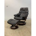 Ekornes, a Stressless leather upholstered reclining chair and footstool, (chair H102cm, W77cm,