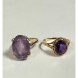A 9ct gold oval amethyst dress ring mounted in claw setting, approx 3.5ct, (N) (4.88g) and a 9ct