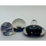 A group of three blown glass paperweights comprising a Leerdam glass blue/green waterdrop/splash