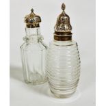 A crystal ribbed barrel shaped condiment bottle mounted with Birmingham 1780 silver pierced top,