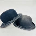 A felted bowler hat, unmarked, (h: 14cm, inner measurement 20cm x 16cm) and another unmarked