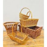A wicker and cane waste paper basket, two rectangular wicker baskets with loop handles to top, a