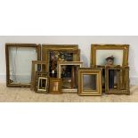 A collection of 14 picture frames, mostly gilt composition