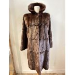 A dyed red squirrel Dominion Fur Company of Church Hill Edinburgh full length lady's coat, with
