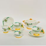 An Art Deco Shelley 1930s morning teaset comprising teapot in cylindrical form with a triangular