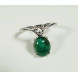 A white metal dress ring mounted oval green jadeite panel, mounted in claw setting, (0.5cm x 0.