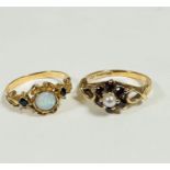 A 9ct gold garnet and pearl open mounted cluster ring set central cultured pearl with surround of