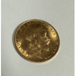 An Edward VII gold sovereign dated 1905