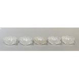 R. Lalique, a set of five opalescent 'Ormeaux' pattern glass teacups, marked verso, H5cm, W13cm (