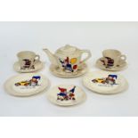 A 1960's child's Noddy themed part tea service comprising three saucers, two teacups, three plates