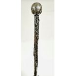 A Japanese Samurai Shokai white metal umbrella handle with scrolling dragon figure and pommel top,