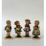 A group of four Hummel figures comprising "A gift from a Friend", "Which Hand?", "For Mother" and "