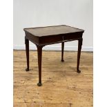 A George III mahogany silver table, the tray top of rectangular outline with scalloped corners